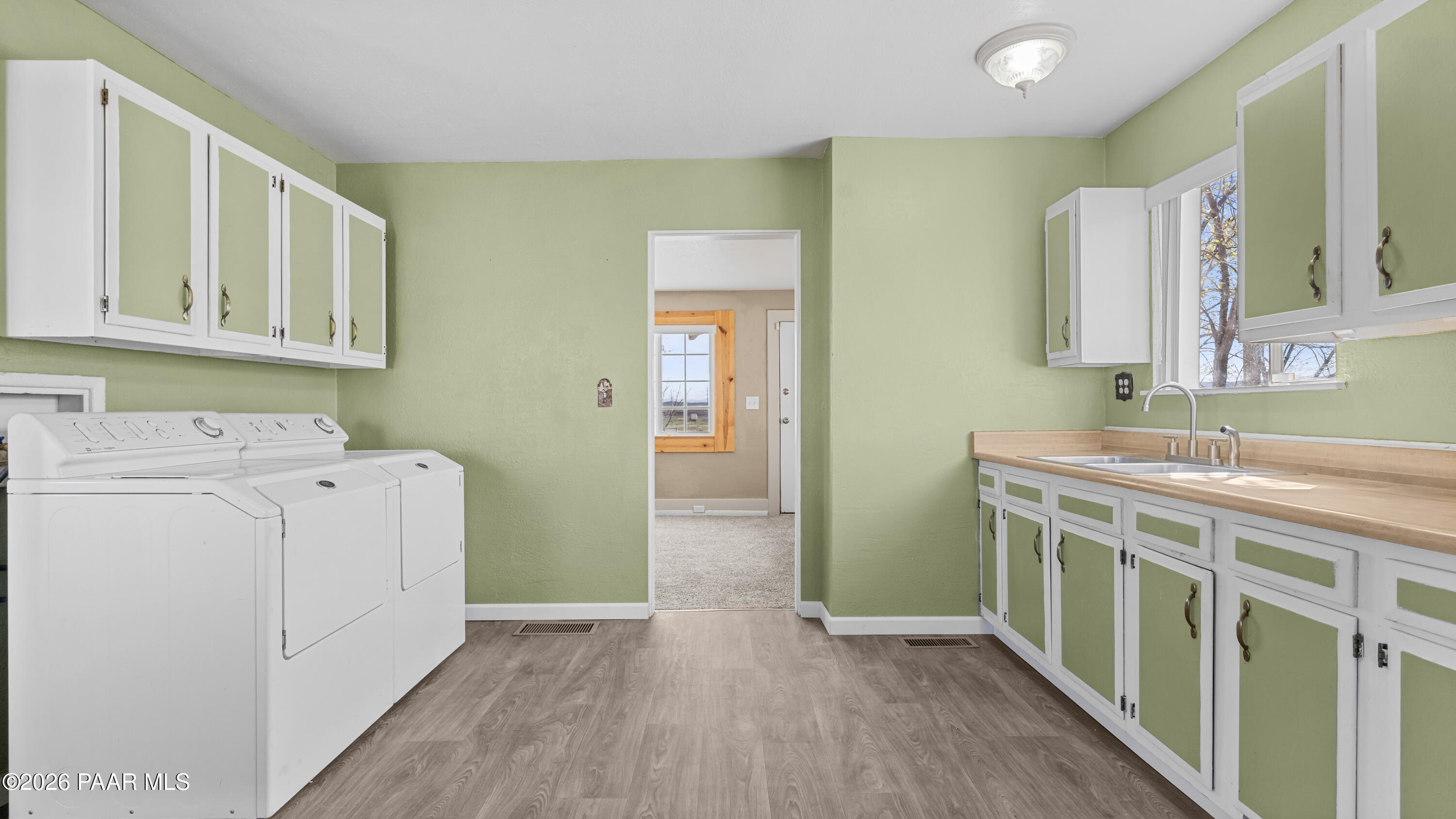 236 West Venice Way Paulden, AZ 86334 - Photo 12 of 42 a bathroom with a sink a toilet and a mirror