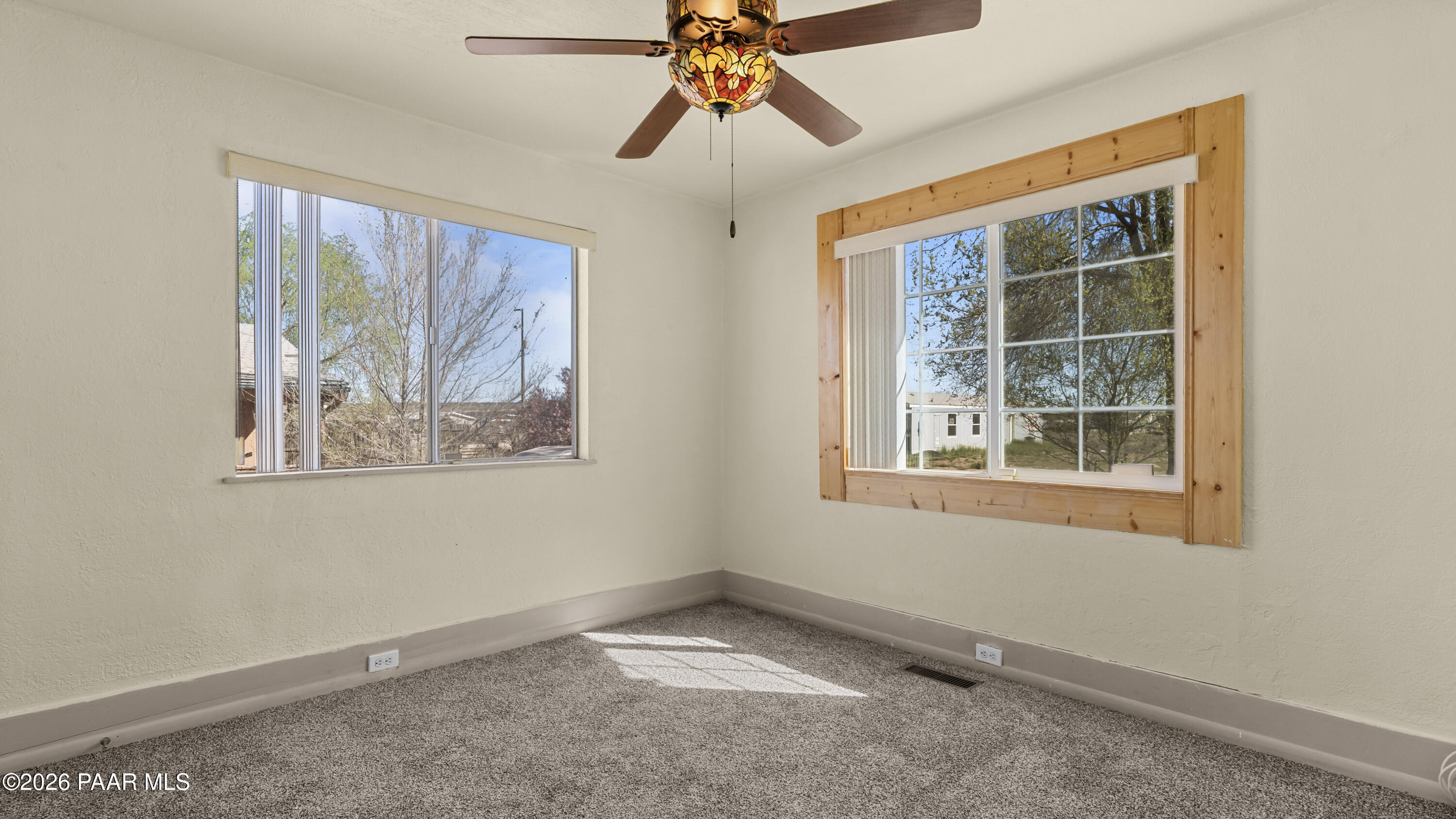 236 West Venice Way Paulden, AZ 86334 - Photo 18 of 42 a view of an empty room with window and cabinet