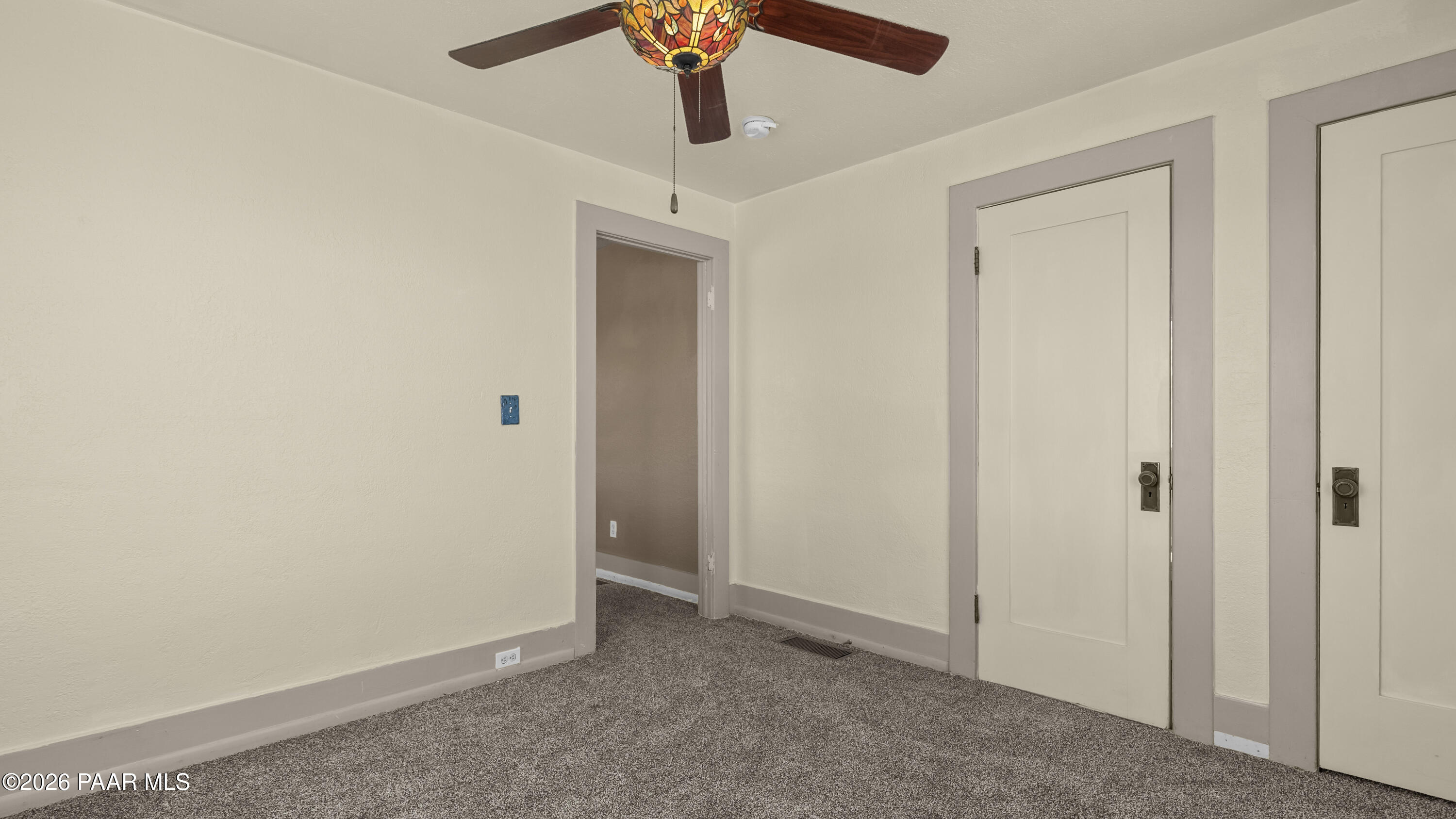 236 West Venice Way Paulden, AZ 86334 - Photo 20 of 42 a view of a hallway with a chandelier fan