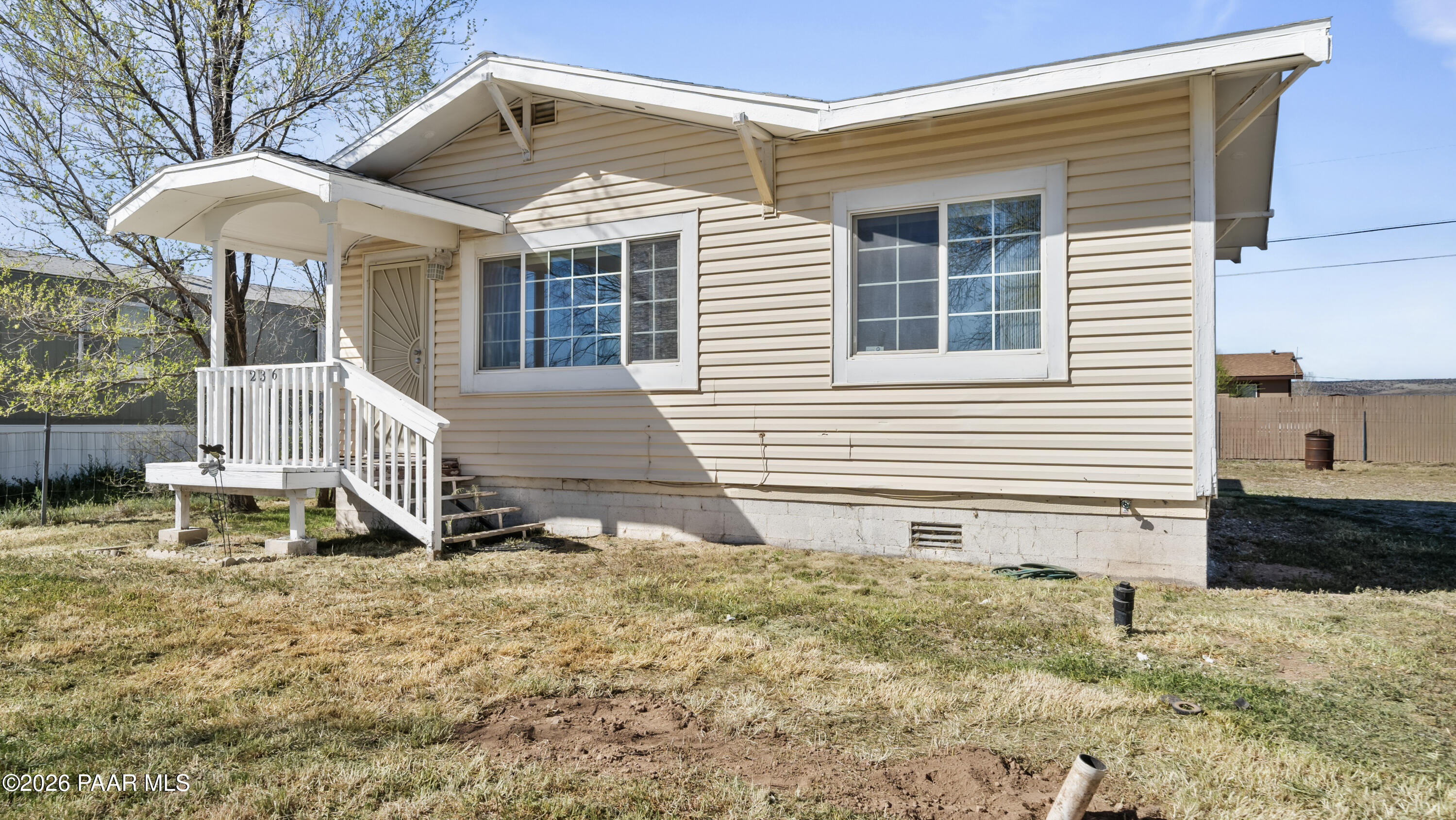 236 West Venice Way Paulden, AZ 86334 - Photo 2 of 42 a view of a house with a yard and sitting area