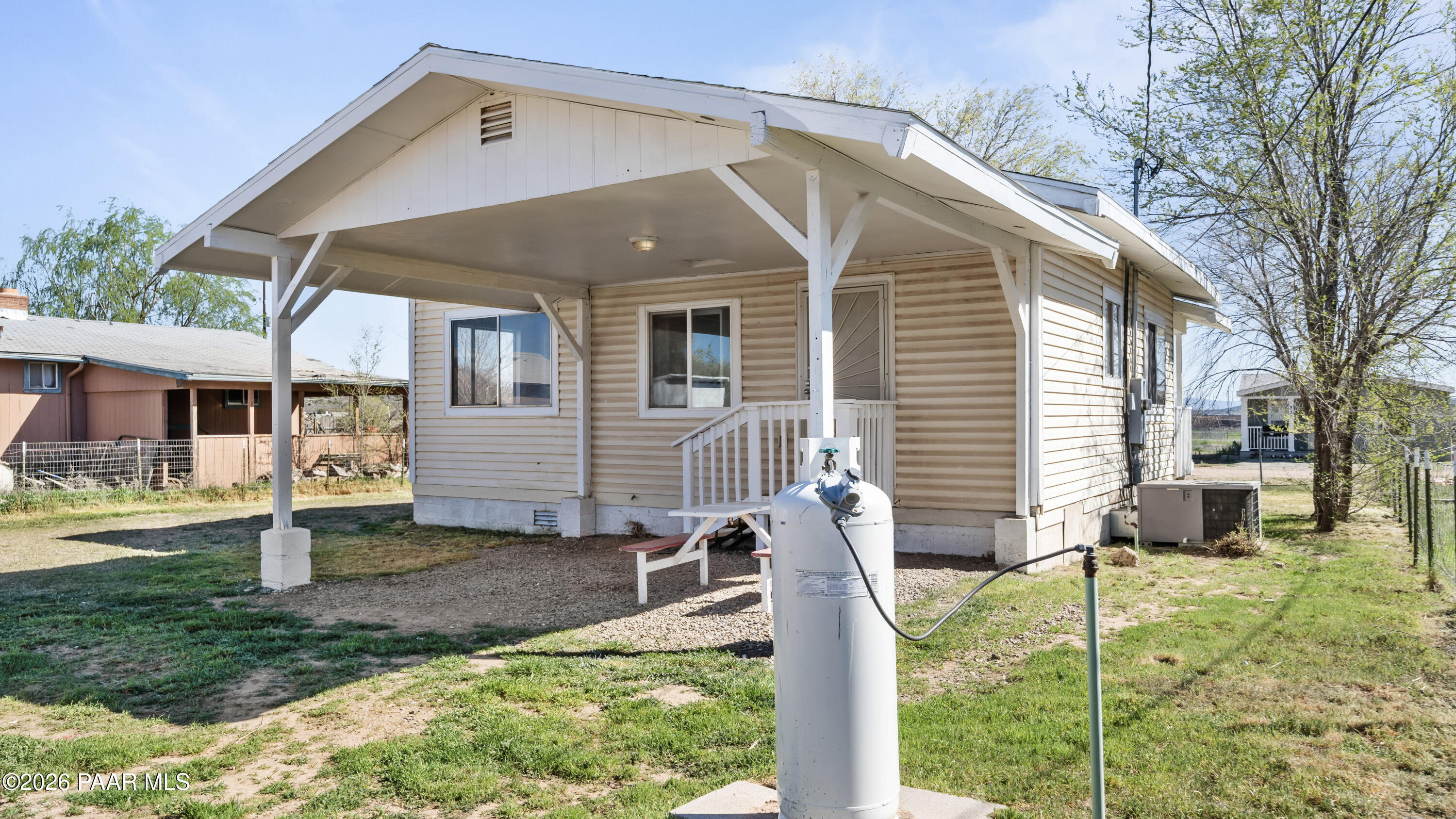 236 West Venice Way Paulden, AZ 86334 - Photo 34 of 42 a front view of a house with a yard