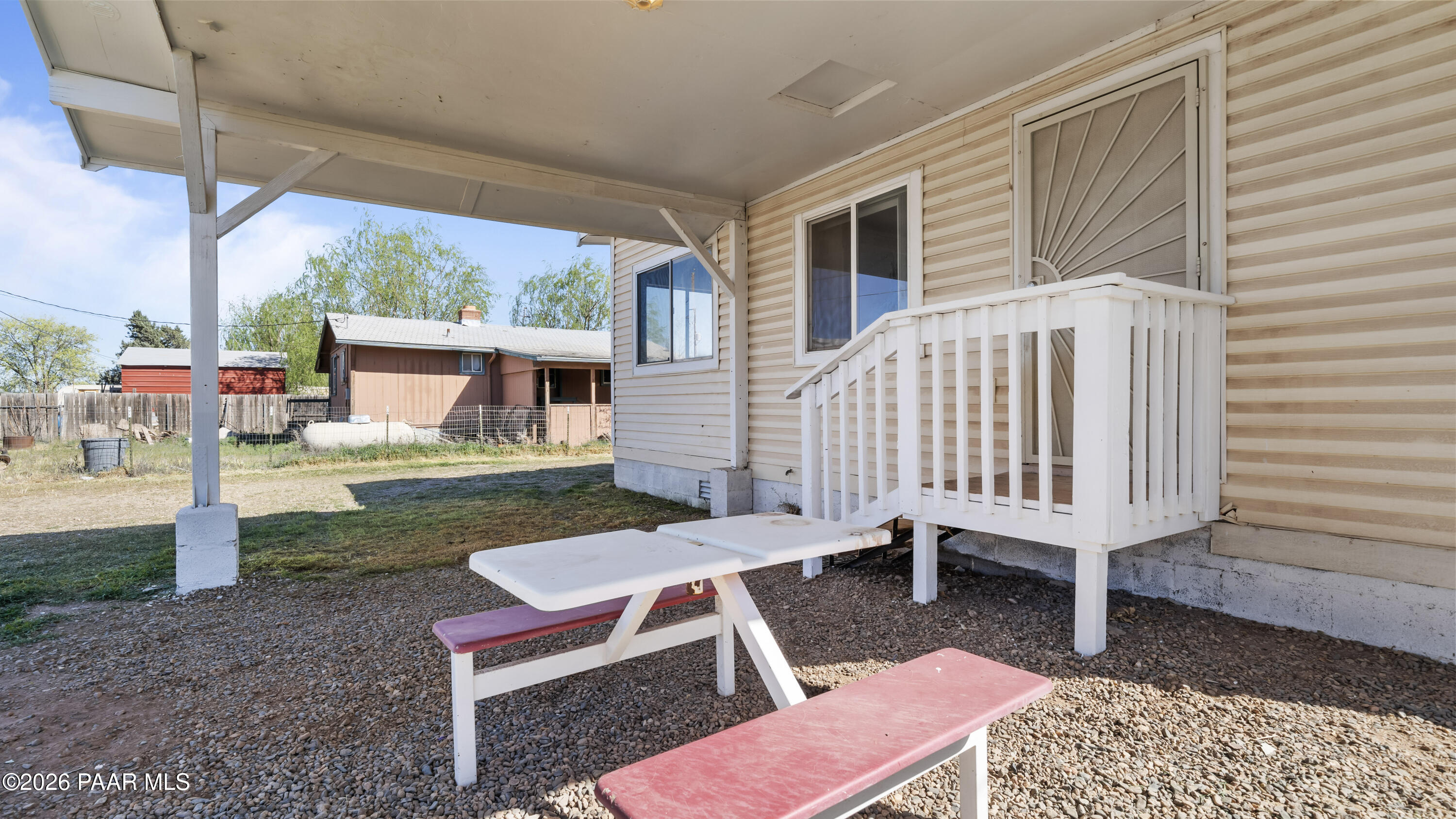 236 West Venice Way Paulden, AZ 86334 - Photo 36 of 42 a view of a backyard with sitting area