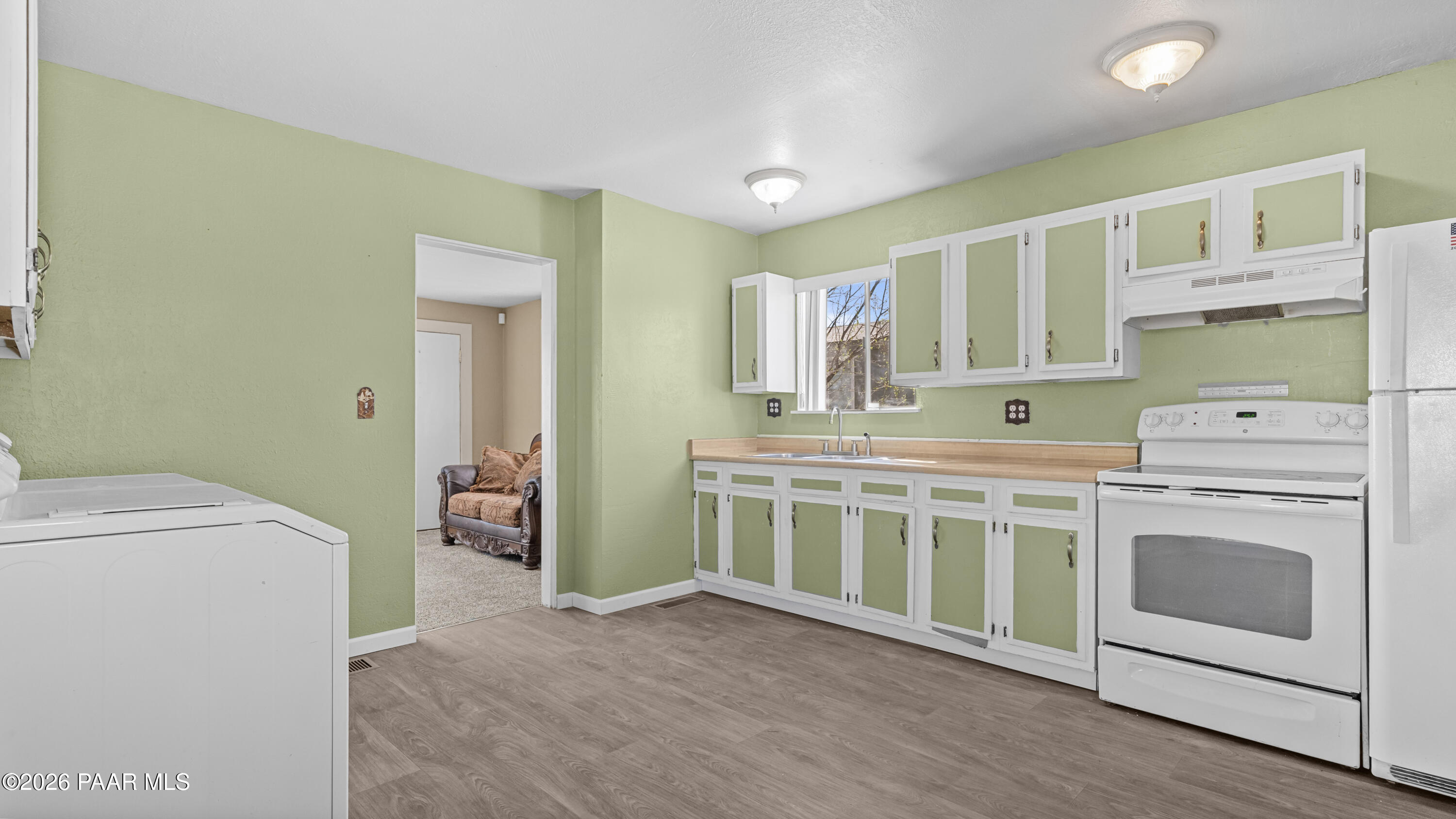 236 West Venice Way Paulden, AZ 86334 - Photo 9 of 42 a kitchen with a stove and a sink