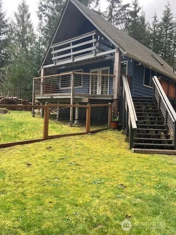 a view of house with swimming pool