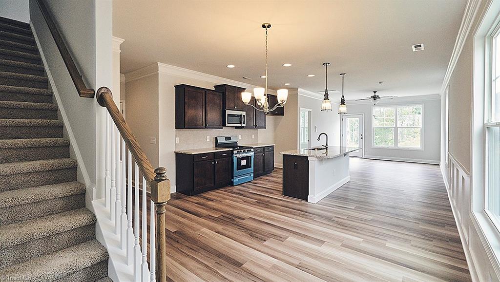 31 Finley Ridge Way, Unit 46 Greensboro, NC 27455 - Photo 23 of 23 Great Open Floorplan, 9 ft ceilings with a gas oven, microwave, dishwasher, disposal