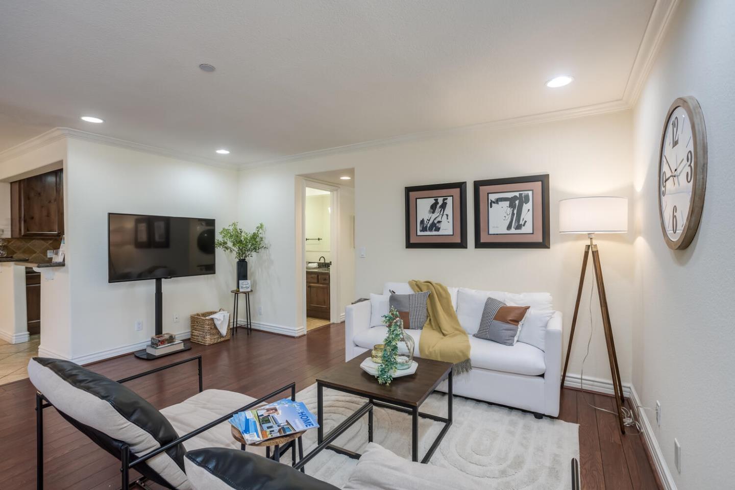 2580 Homestead Road, Unit 5101 Santa Clara, CA 95051 - Photo 1 of 33 a living room with furniture and a flat screen tv
