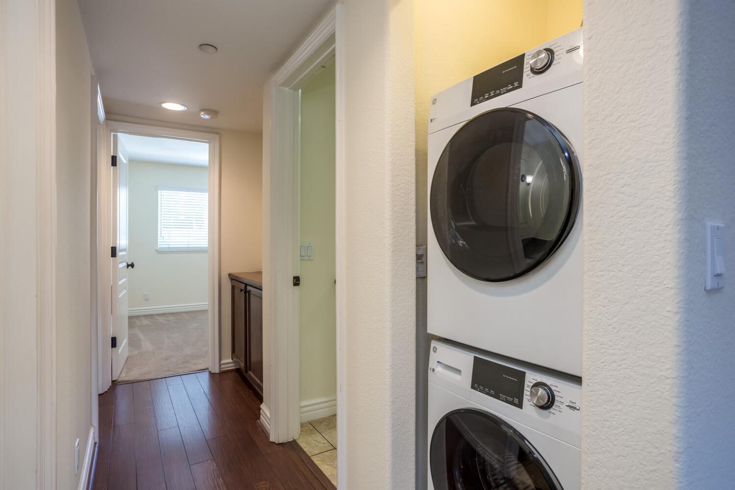 2580 Homestead Road, Unit 5101 Santa Clara, CA 95051 - Photo 12 of 33 a view of a hallway with washer and dryer