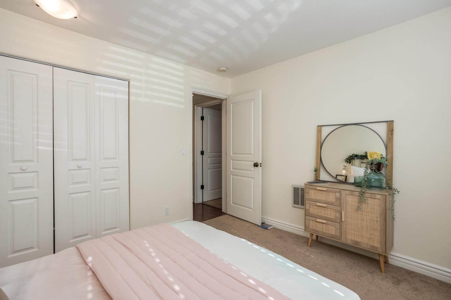 2580 Homestead Road, Unit 5101 Santa Clara, CA 95051 - Photo 15 of 33 a bedroom with a bed and a dresser