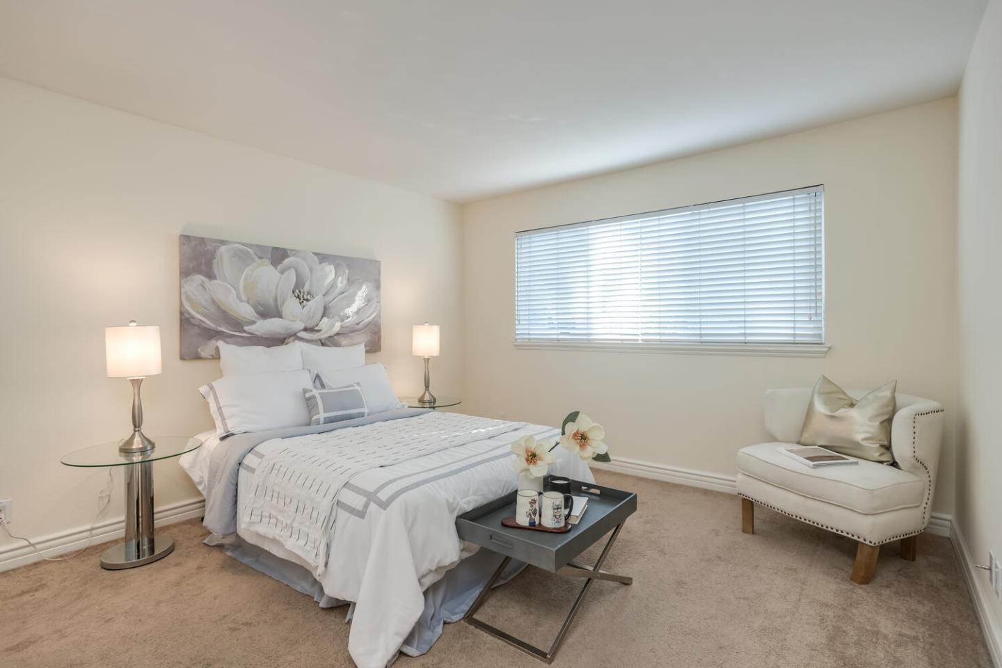 2580 Homestead Road, Unit 5101 Santa Clara, CA 95051 - Photo 17 of 33 a bedroom with a bed and a couch