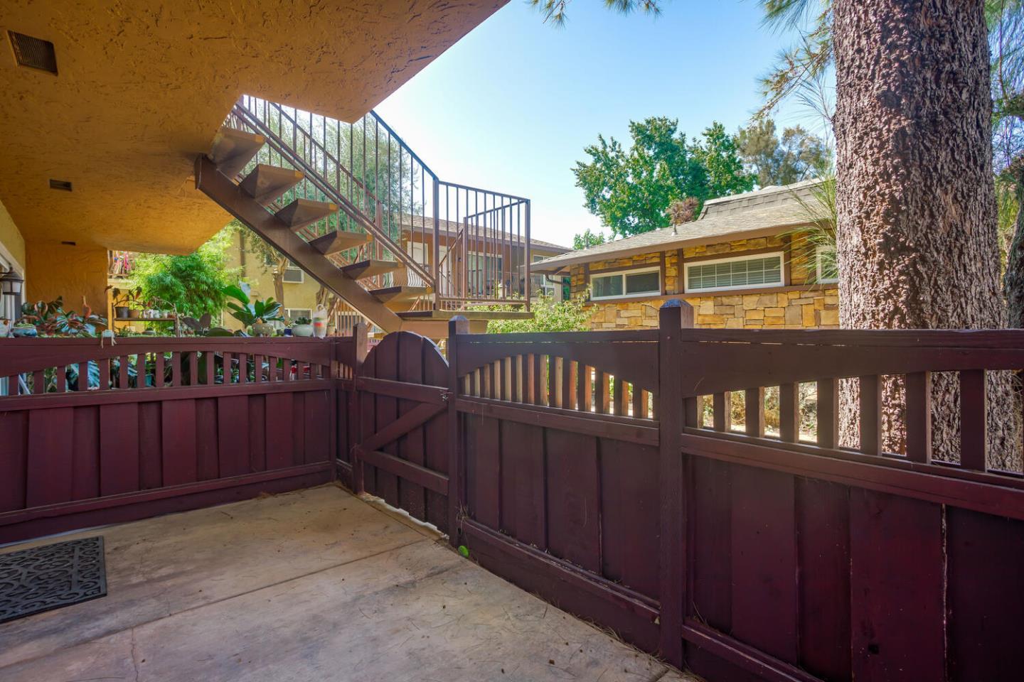 2580 Homestead Road, Unit 5101 Santa Clara, CA 95051 - Photo 24 of 33 a view of deck with wooden fence and floor