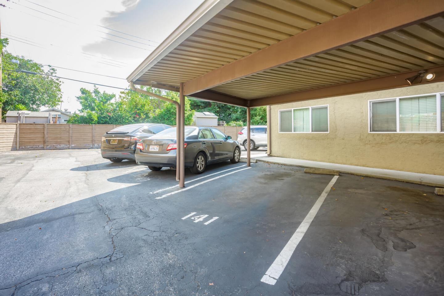 2580 Homestead Road, Unit 5101 Santa Clara, CA 95051 - Photo 25 of 33 a living room with patio furniture and a backyard