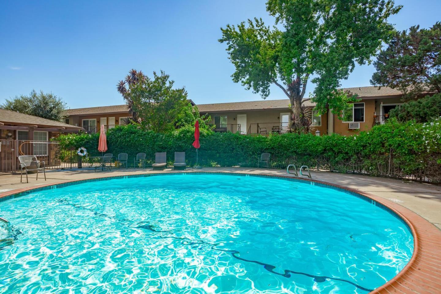 2580 Homestead Road, Unit 5101 Santa Clara, CA 95051 - Photo 30 of 33 a view of a house with a backyard and a patio