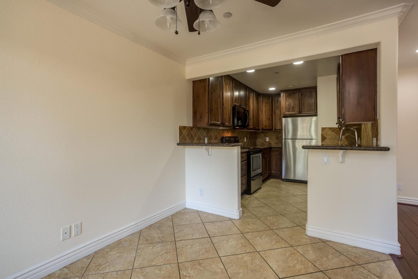 2580 Homestead Road, Unit 5101 Santa Clara, CA 95051 - Photo 8 of 33 a view of kitchen with microwave and cabinets