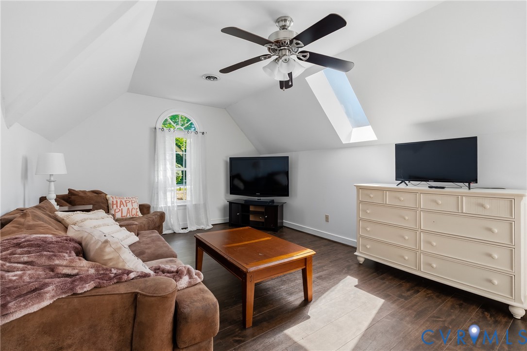 14321 Crossings Ridge Drive Midlothian, VA 23113 - Photo 27 of 43 a living room with furniture and a flat screen tv