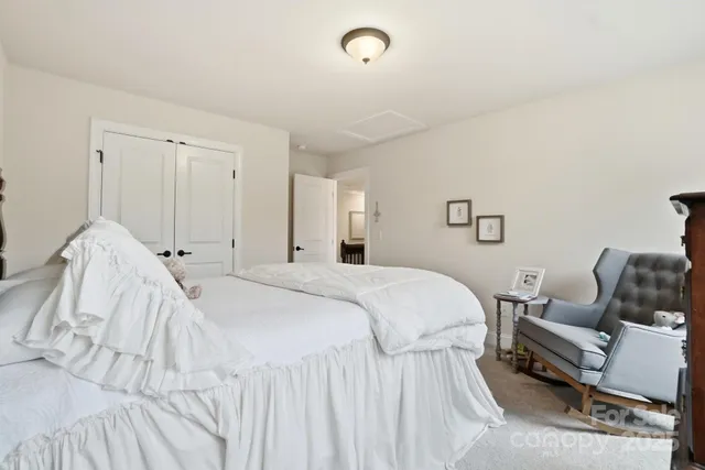 a bathroom with a sink toilet and a mirror