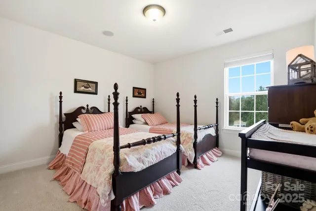 a room with gym equipment and a large window