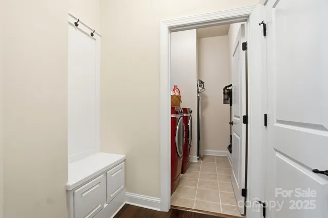 an aerial view of a house with swimming pool