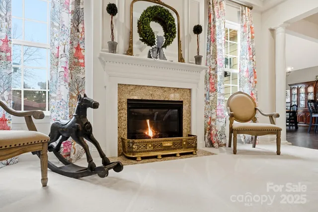 a kitchen with kitchen island stainless steel appliances a sink stove and refrigerator