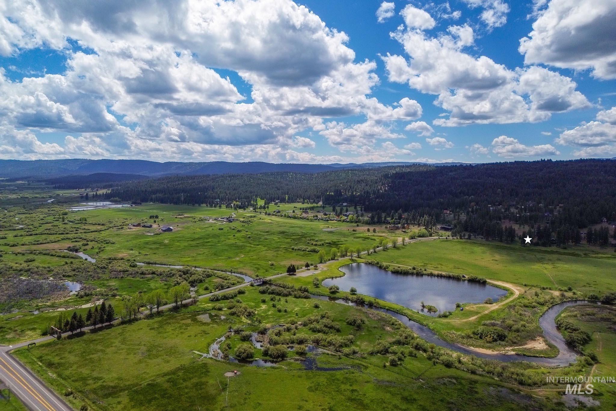 3000 45th Parallel Drive New Meadows, ID 83654 - Photo 3 of 45 Bird's eye view of a water and mountain view and a heavily wooded area