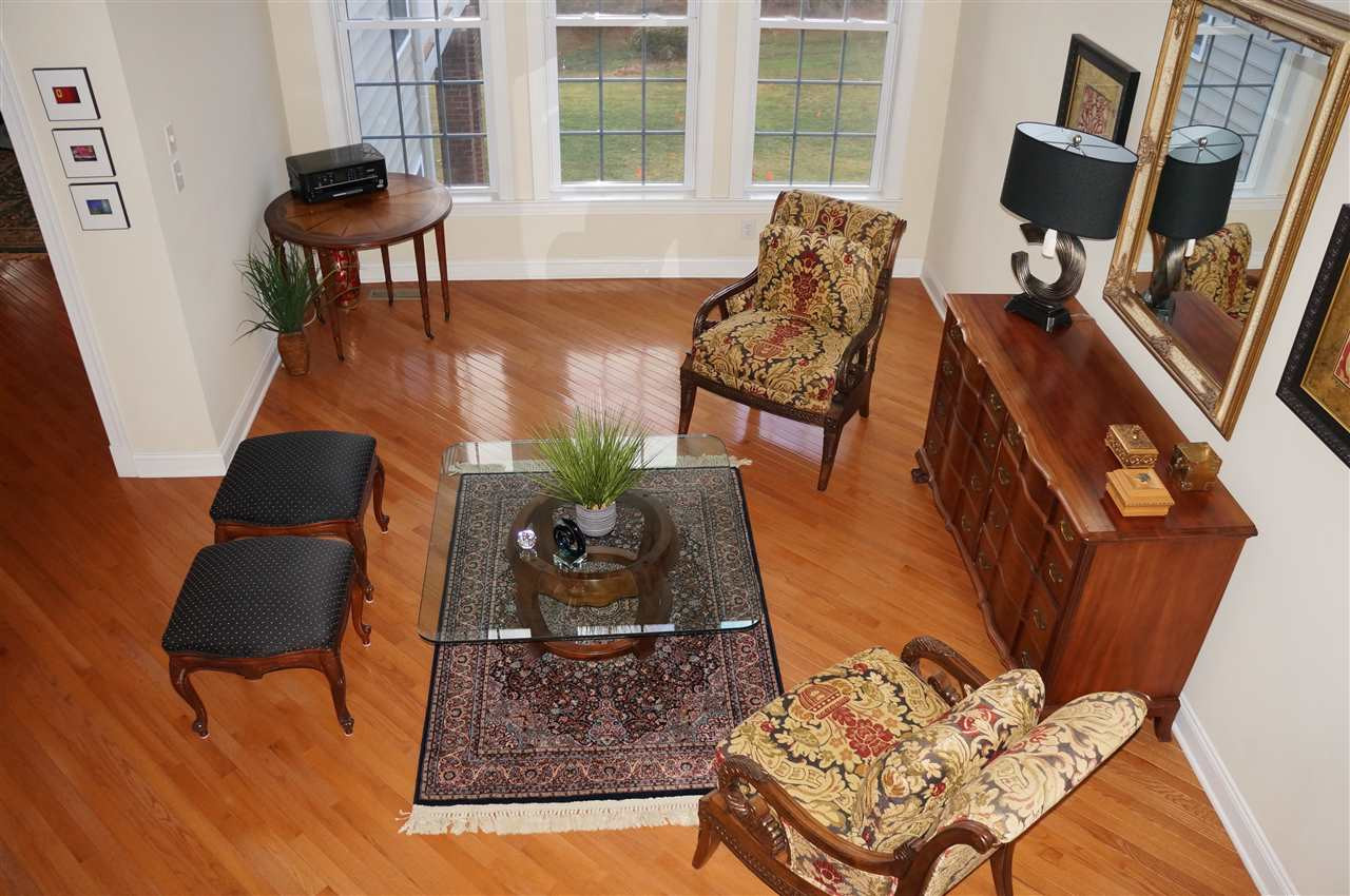 10913 Clovermill Circle Raleigh, NC 27617 - Photo 3 of 25 Looking down from the 2nd floor into the 2 story living room! Living room view from 2nd floor