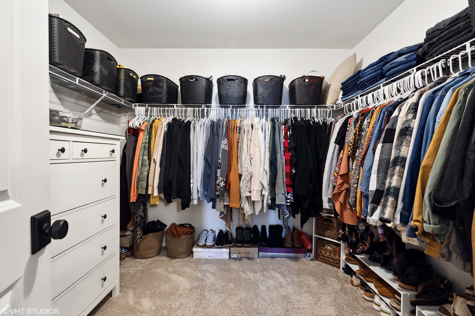3302 Batley Street Elgin, IL 60124 - Photo 17 of 28 a view of walk in closet with clothes and shoes