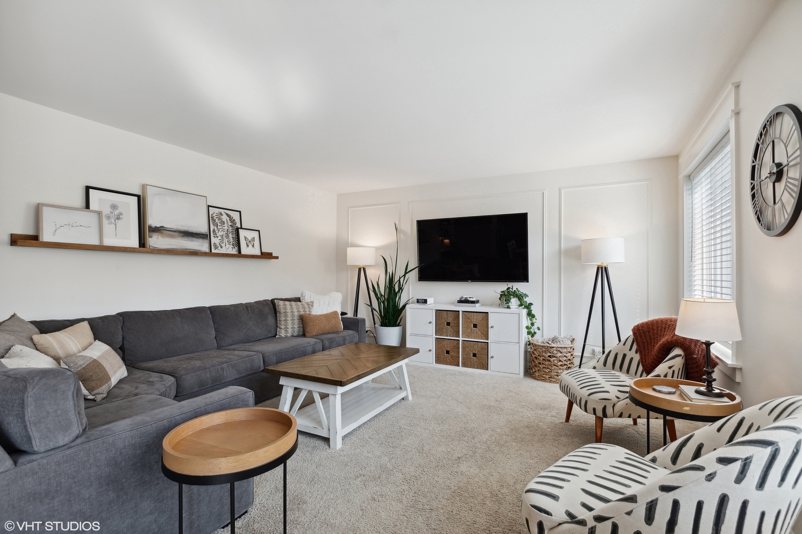 3302 Batley Street Elgin, IL 60124 - Photo 10 of 28 a living room with furniture a flat screen tv and a window