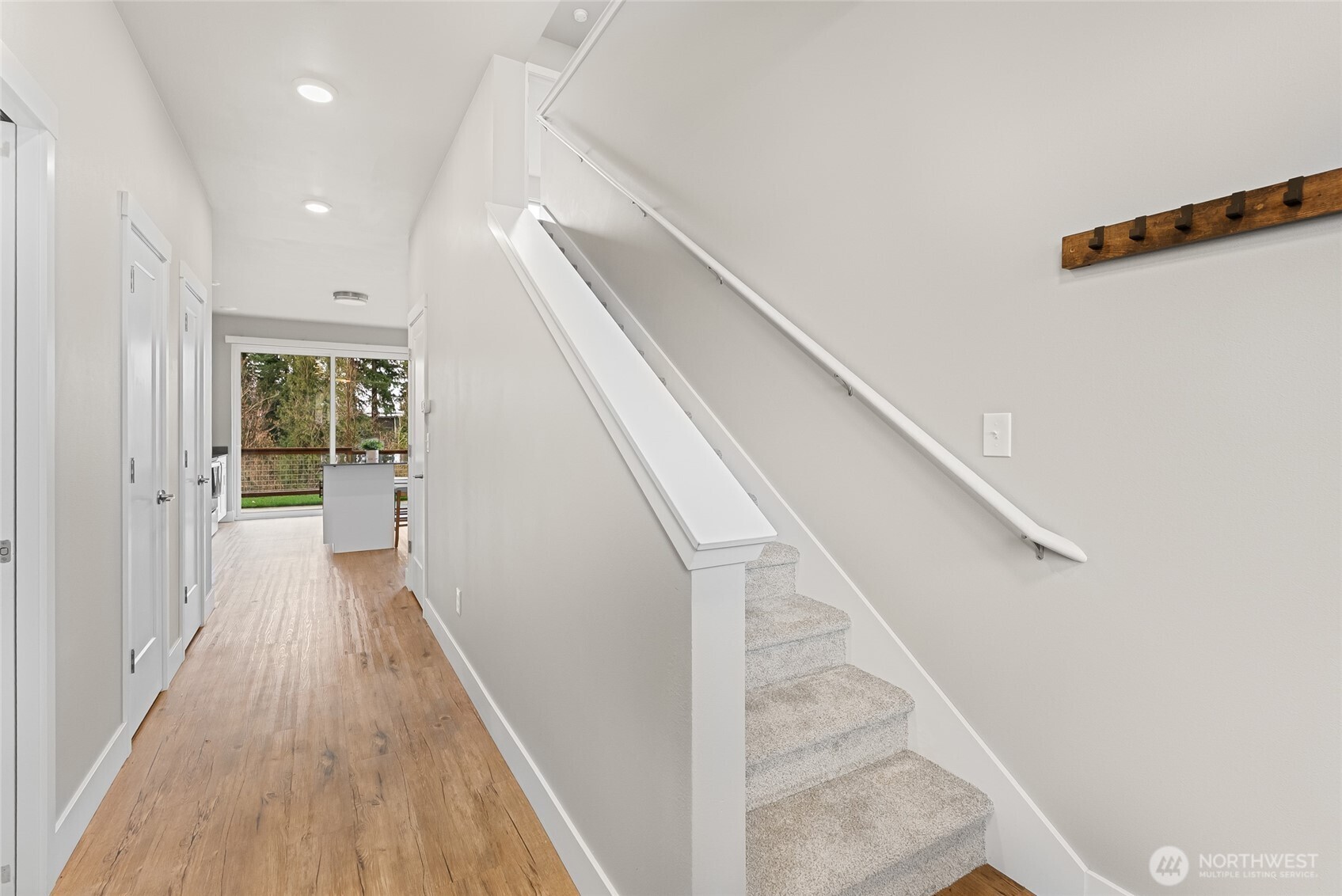 1884 Front Street Lynden, WA 98264 - Photo 16 of 35 a view of a hallway with wooden floor and staircase