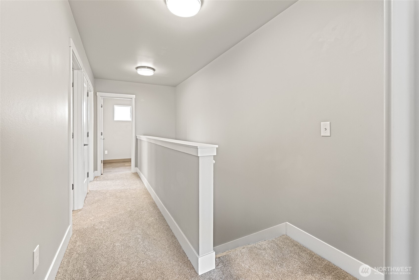 1884 Front Street Lynden, WA 98264 - Photo 17 of 35 a view of a hallway with wooden floor and entryway