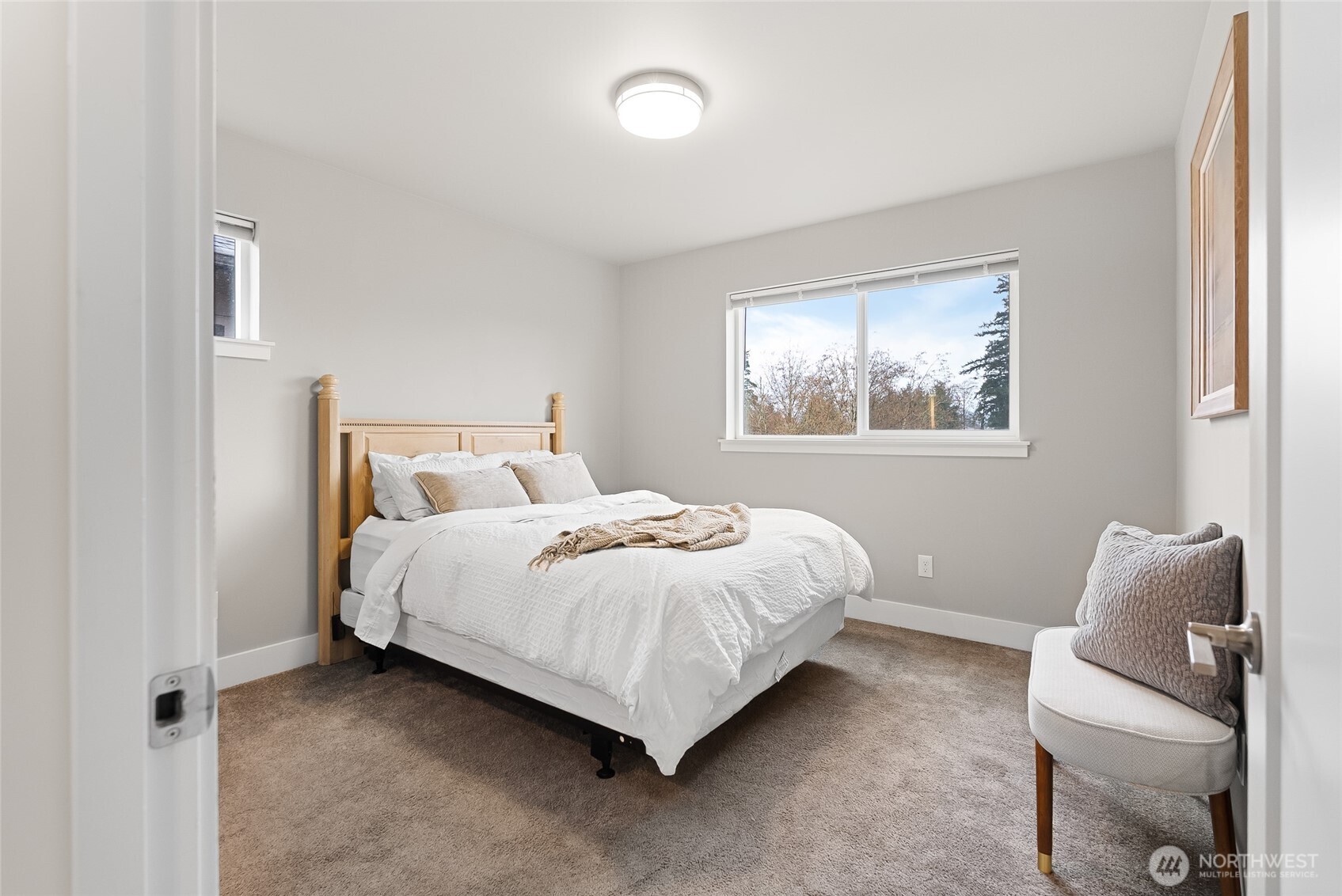 1884 Front Street Lynden, WA 98264 - Photo 18 of 35 a bedroom with a bed and window