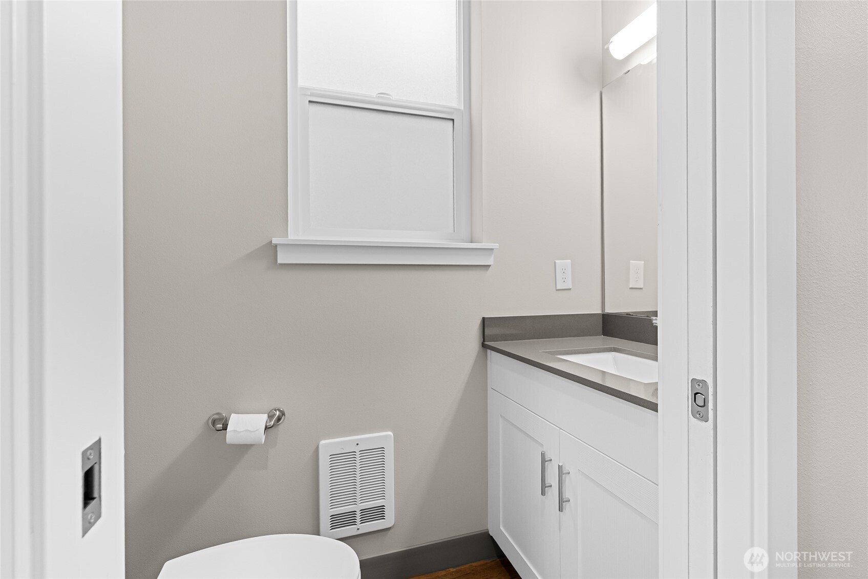 1884 Front Street Lynden, WA 98264 - Photo 29 of 35 a bathroom with a granite countertop sink and a toilet
