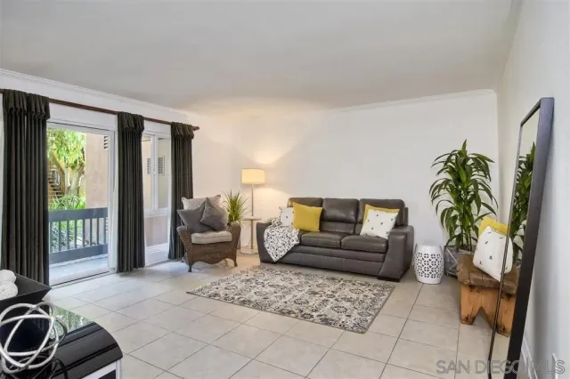 a living room with furniture and a couch
