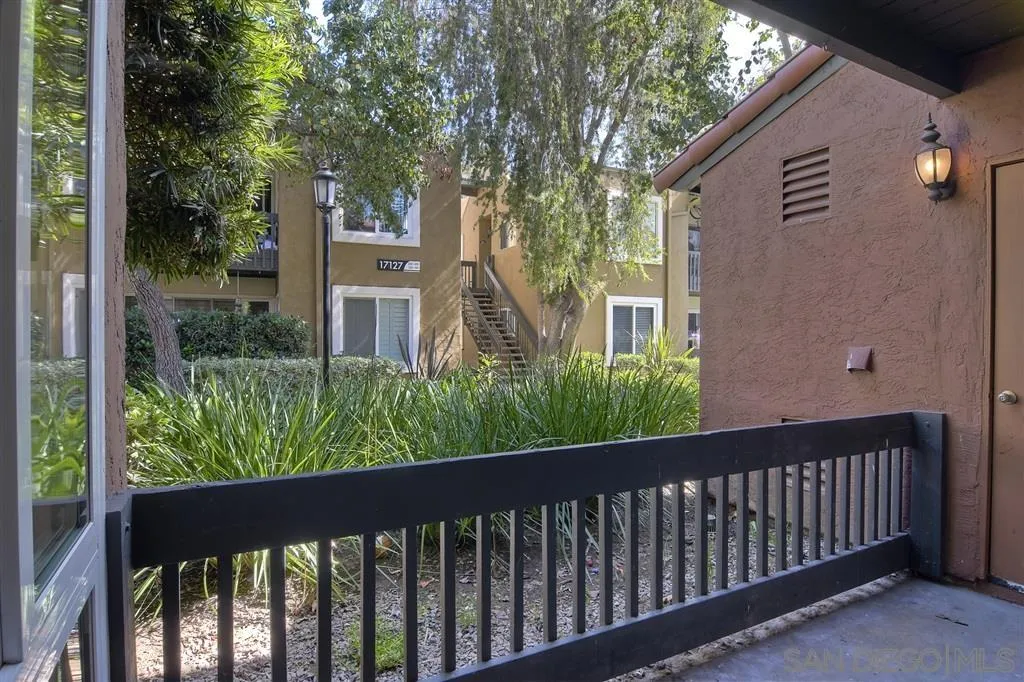 17119 West Bernardo Drive, Unit 108 San Diego, CA 92127 - Photo 17 of 18 a balcony with trees in front of it