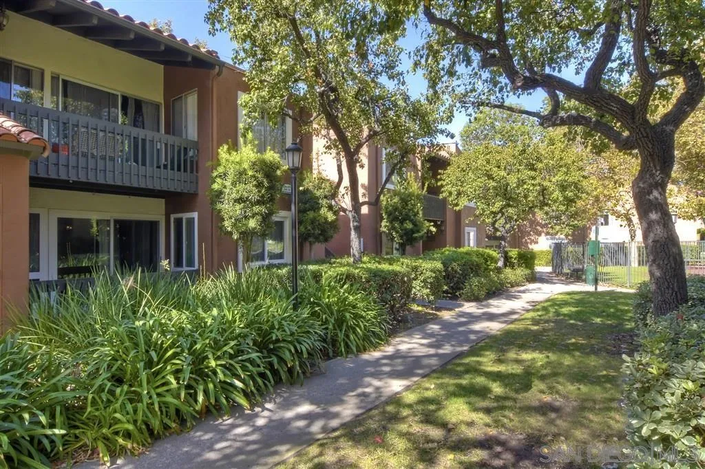 17119 West Bernardo Drive, Unit 108 San Diego, CA 92127 - Photo 18 of 18 a view of a house with a tree in a yard