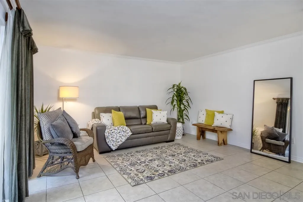 17119 West Bernardo Drive, Unit 108 San Diego, CA 92127 - Photo 2 of 18 a living room with furniture and a couch