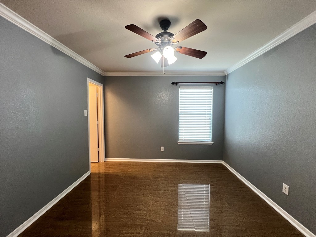 915 Wild Cotton Road Rosenberg, TX 77471 - Photo 21 of 38 a view of room with window and ceiling fan