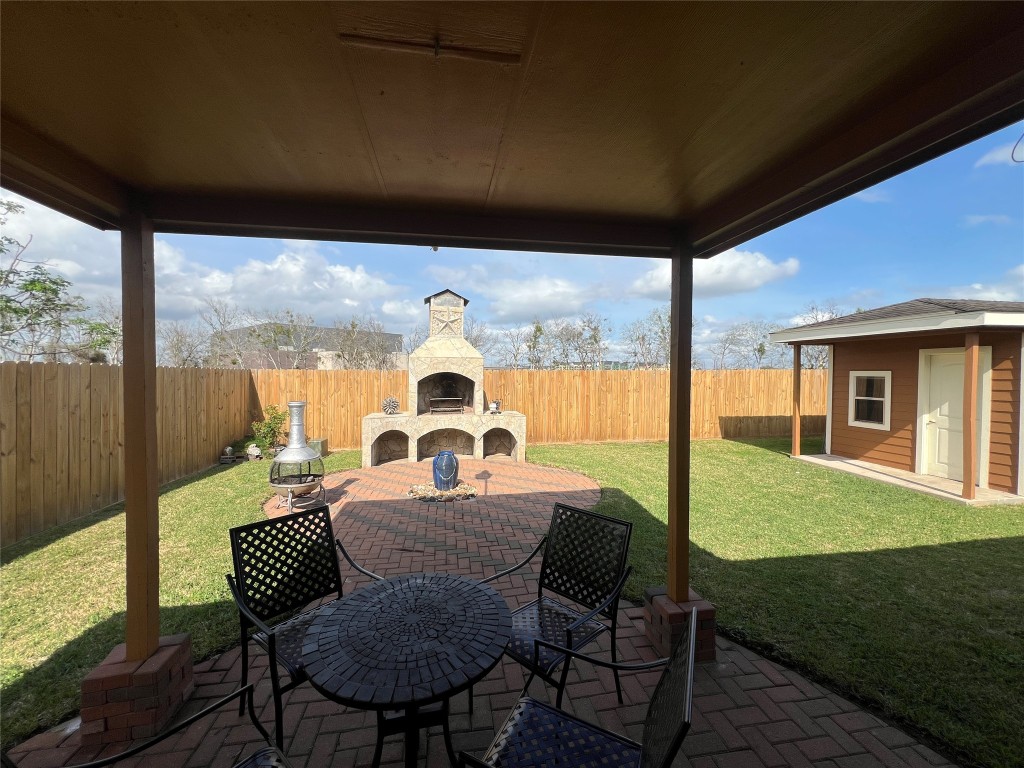 915 Wild Cotton Road Rosenberg, TX 77471 - Photo 31 of 38 a view of an outdoor space with furniture and garden