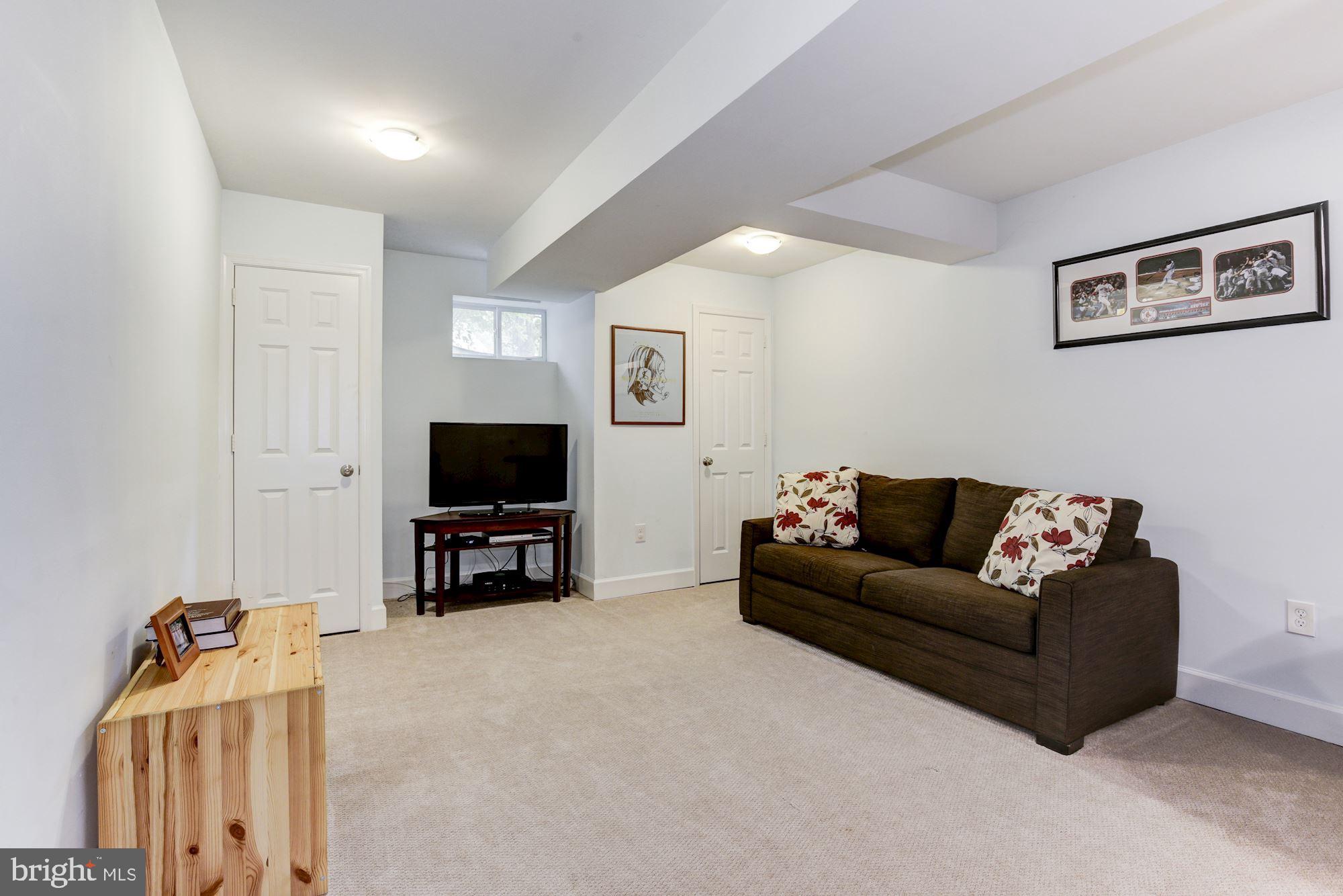 9907 Harrogate Road Bethesda, MD 20817 - Photo 13 of 17 Lower level recreation room