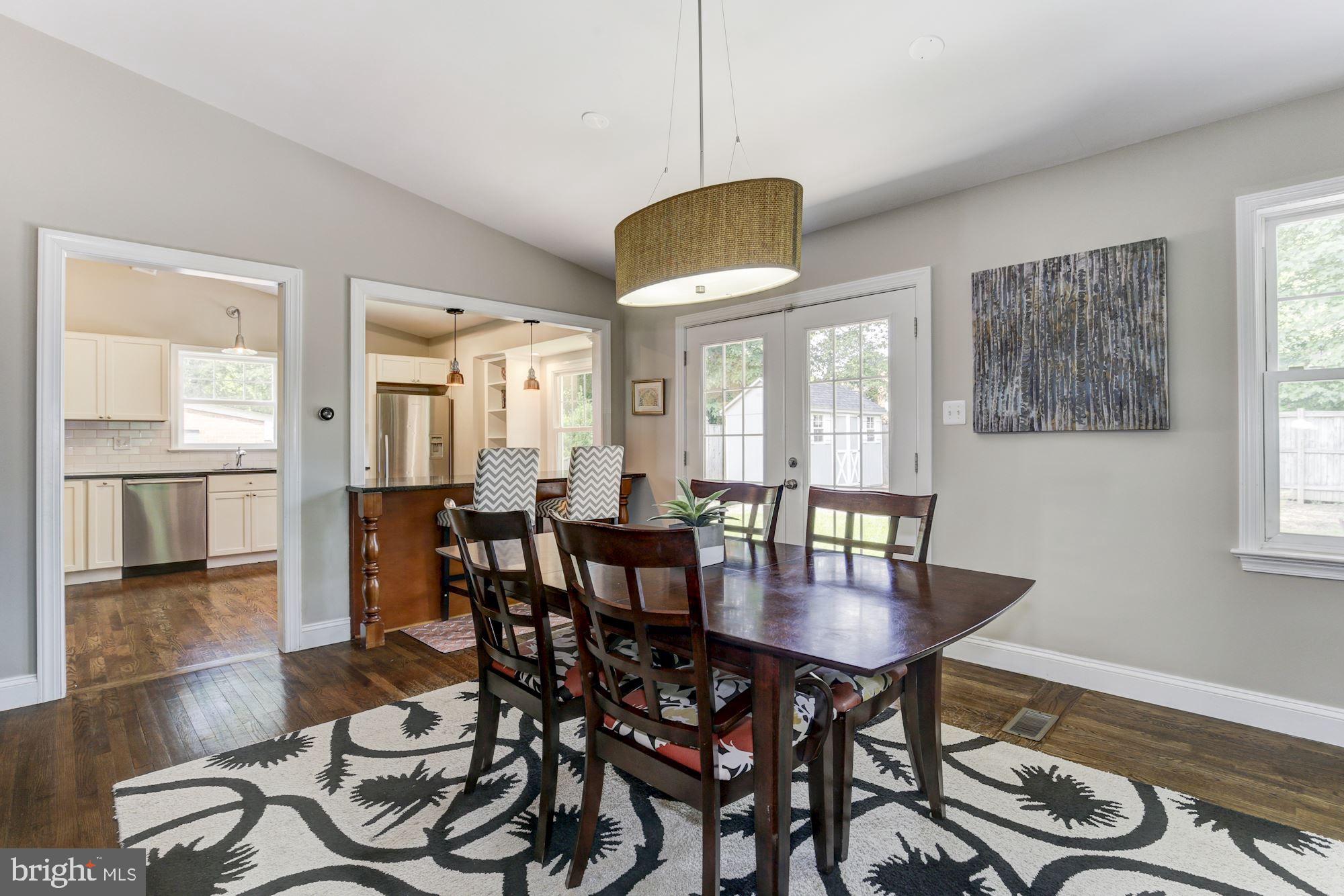 9907 Harrogate Road Bethesda, MD 20817 - Photo 3 of 17 Dining area with French doors to backyard