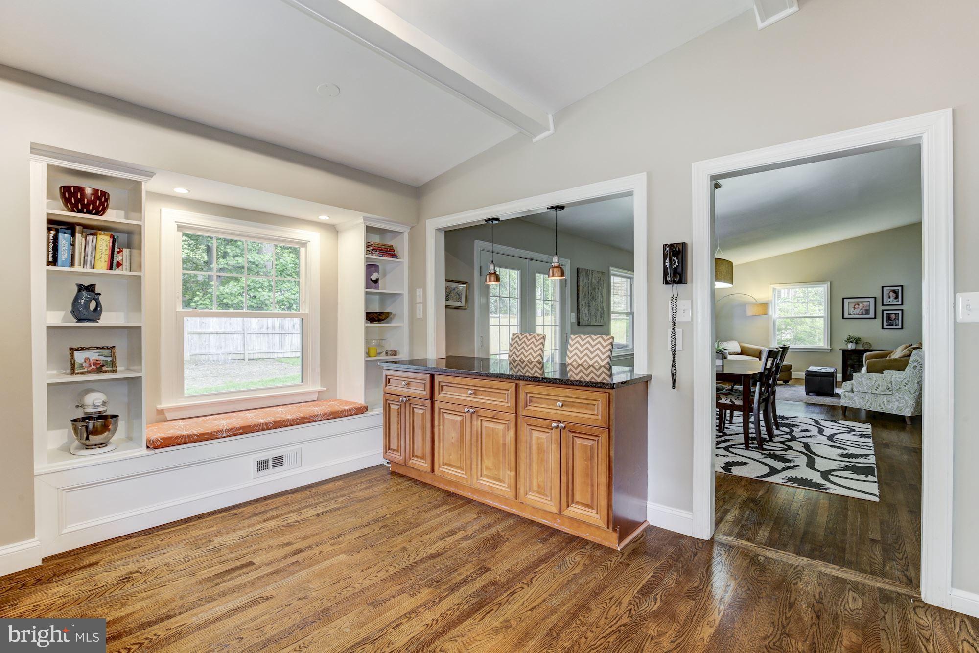 9907 Harrogate Road Bethesda, MD 20817 - Photo 7 of 17 Granite countertops, custom built-in shelving