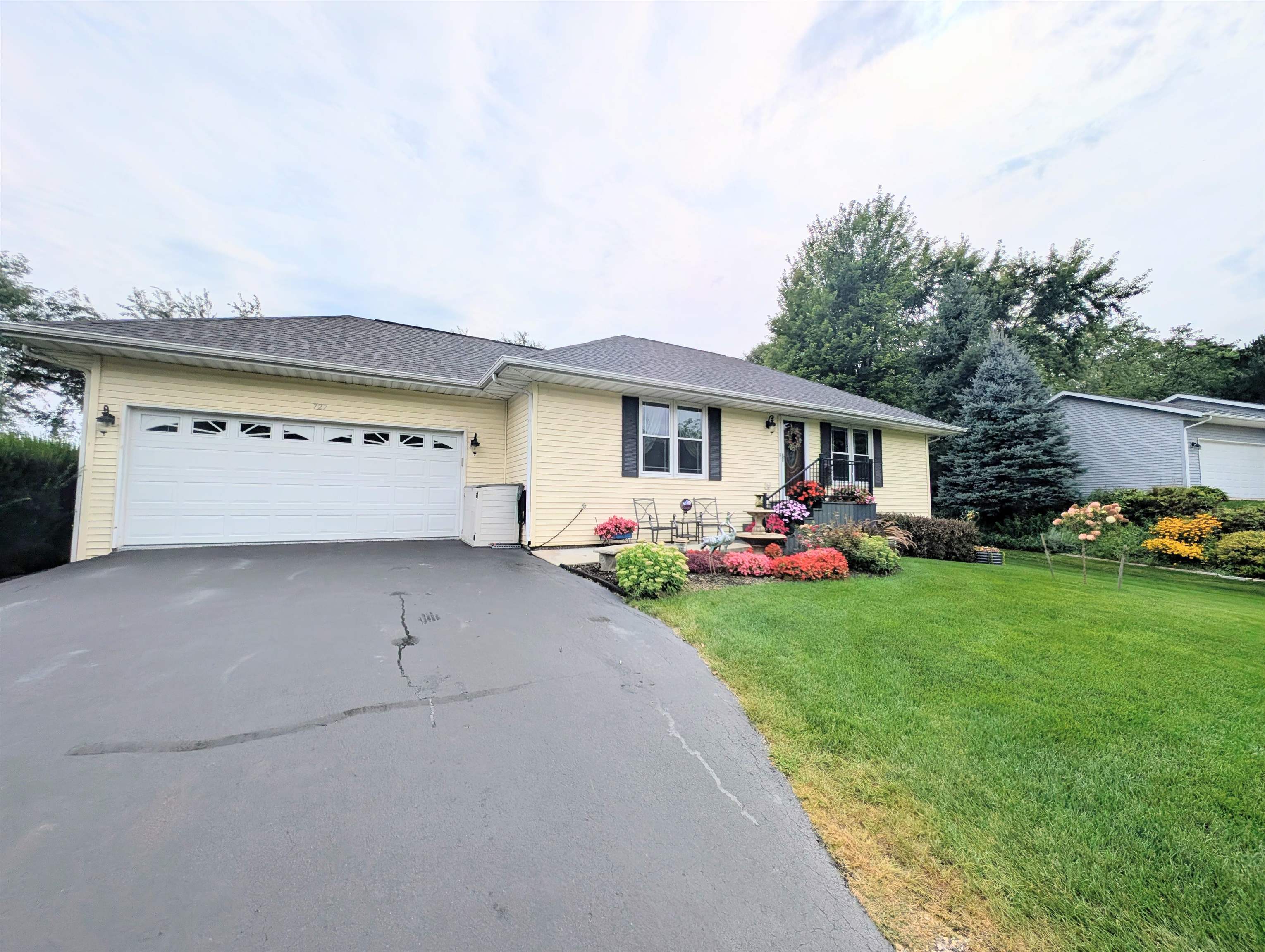 727 Westmore Road Davis, IL 61019 - Photo 1 of 32 a view of a house with backyard and sitting area