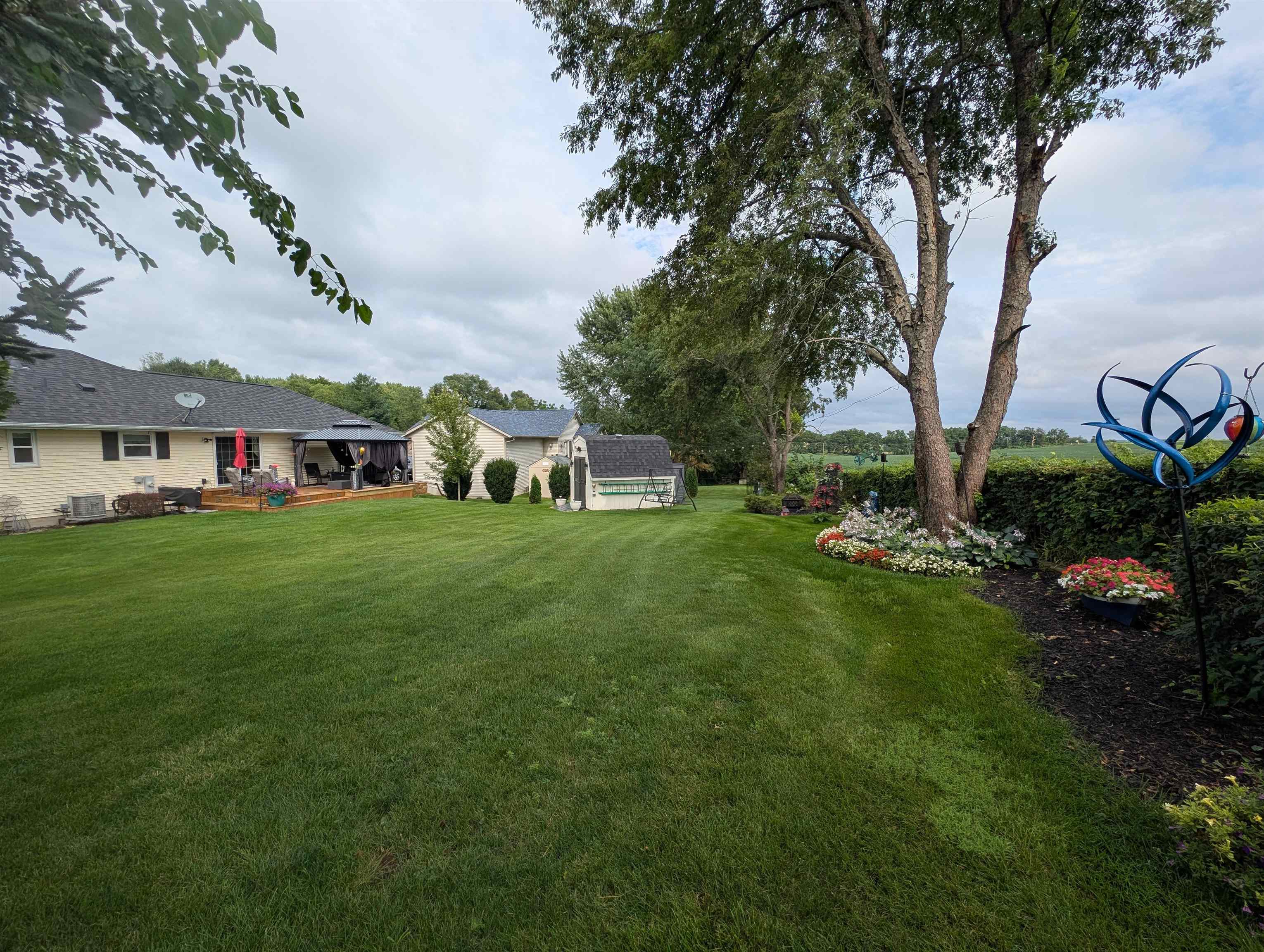 727 Westmore Road Davis, IL 61019 - Photo 27 of 32 a view of an house with backyard space and garden