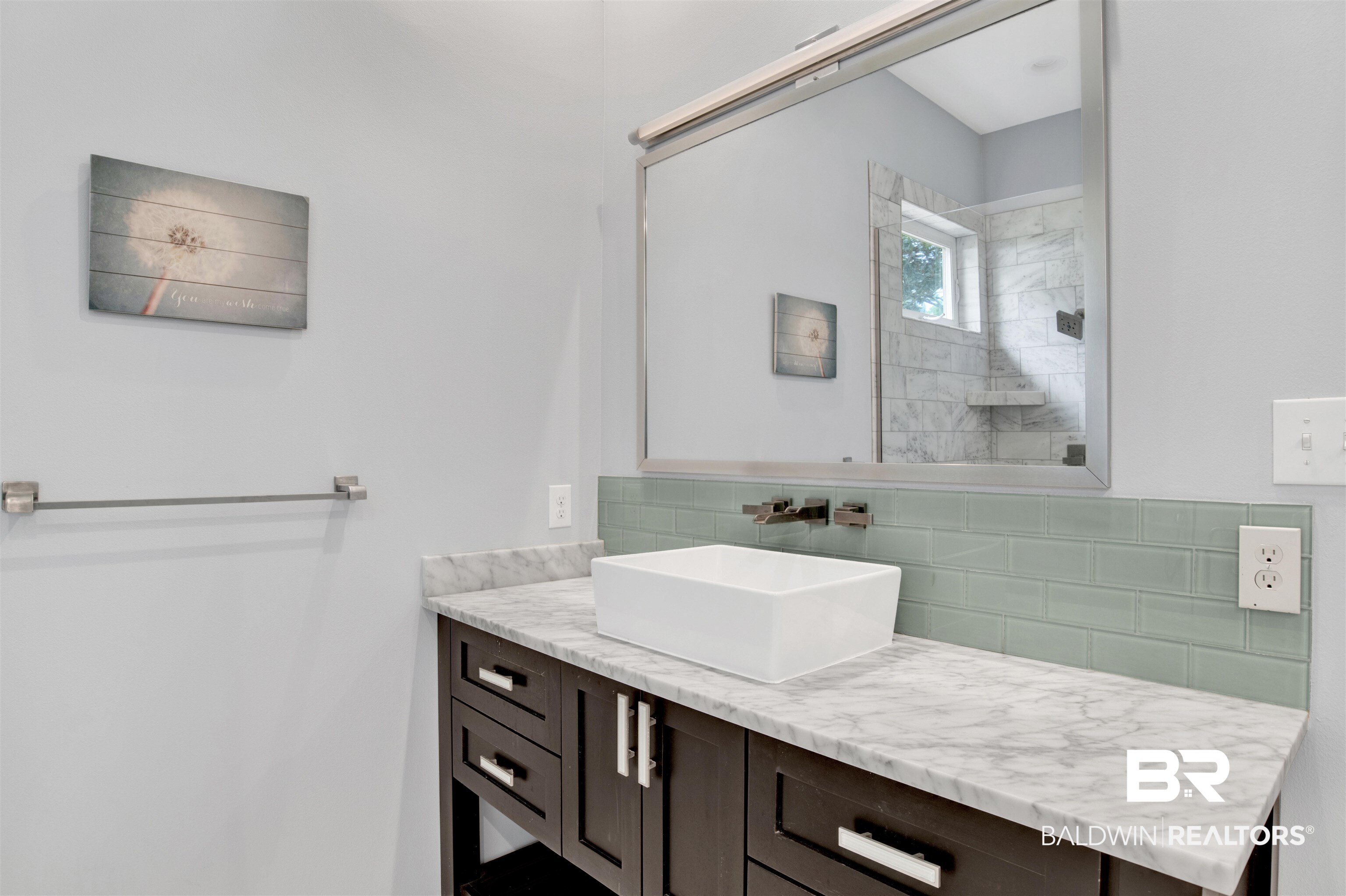27980 Canal Road Orange Beach, AL 36561 - Photo 33 of 46 Bathroom featuring tasteful backsplash, vanity, and a tile shower