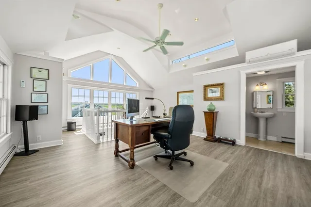 a bathroom with a sink a mirror and a window