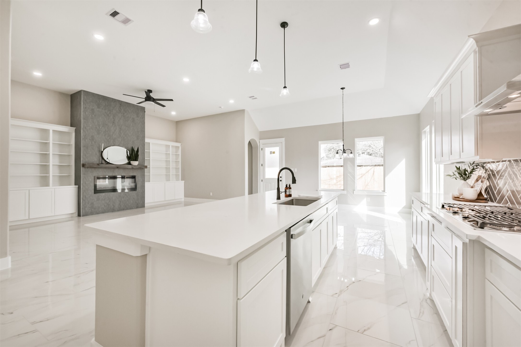 2803 Lancaster Lane Pasadena, TX 77506 - Photo 12 of 45 a large kitchen with kitchen island a large island a sink stainless steel appliances and cabinets