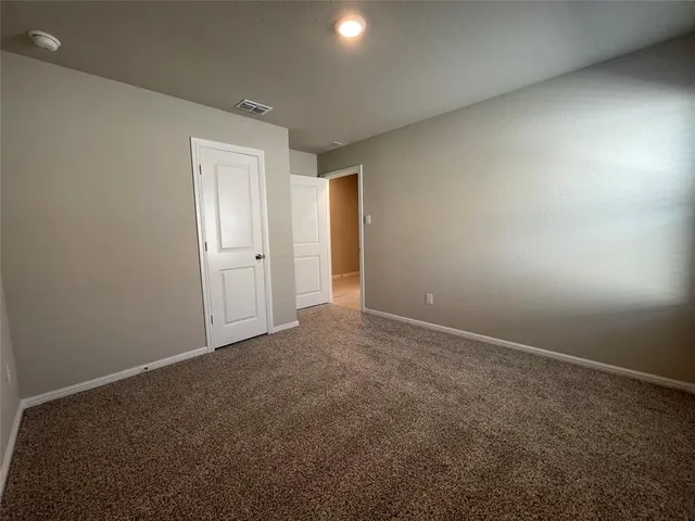 an empty room with an entryway