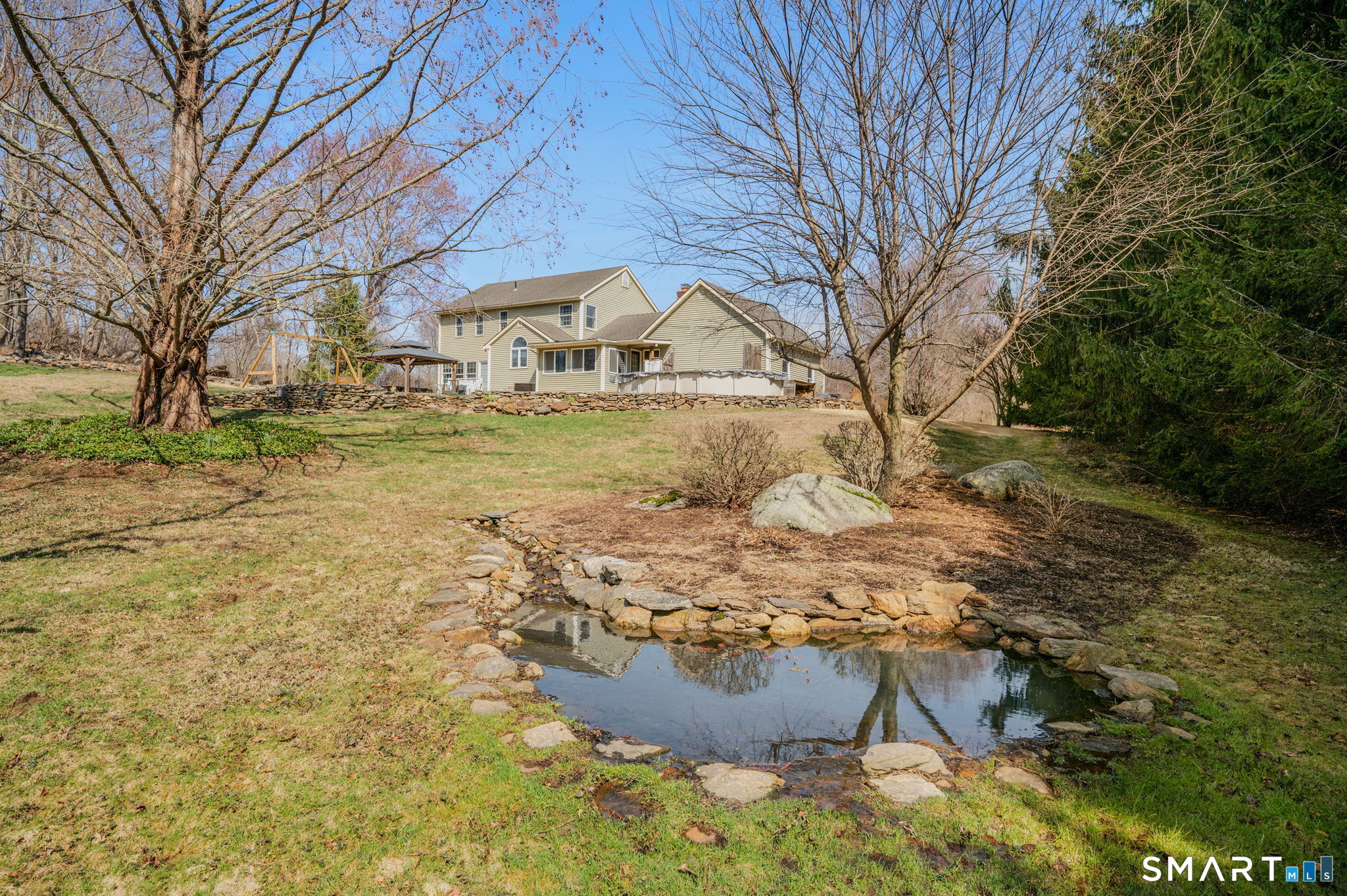 20 Coco Drive Colchester, CT 06415 - Photo 37 of 40 a view of a yard with a house
