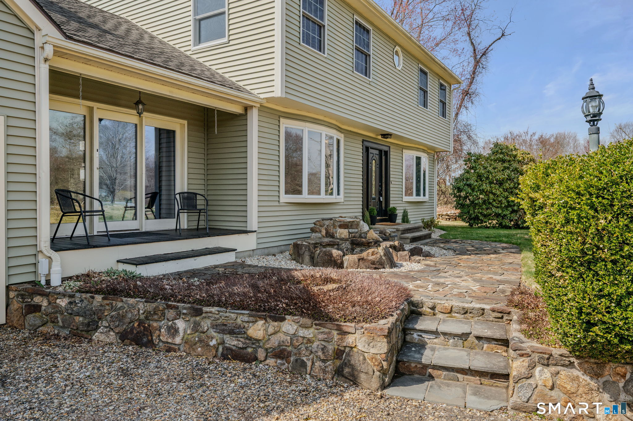 20 Coco Drive Colchester, CT 06415 - Photo 4 of 40 a front view of a house with garden