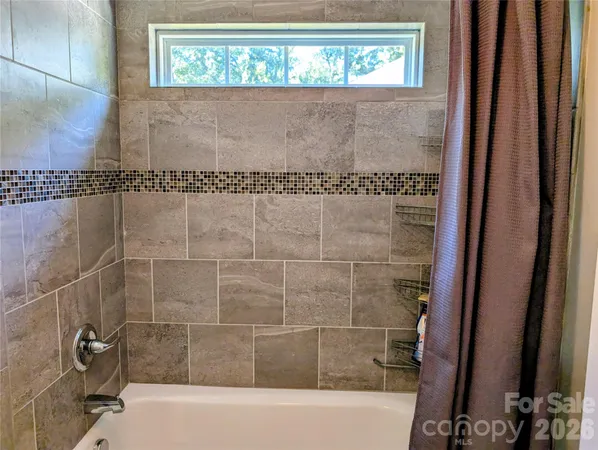 a bathroom with a bathtub