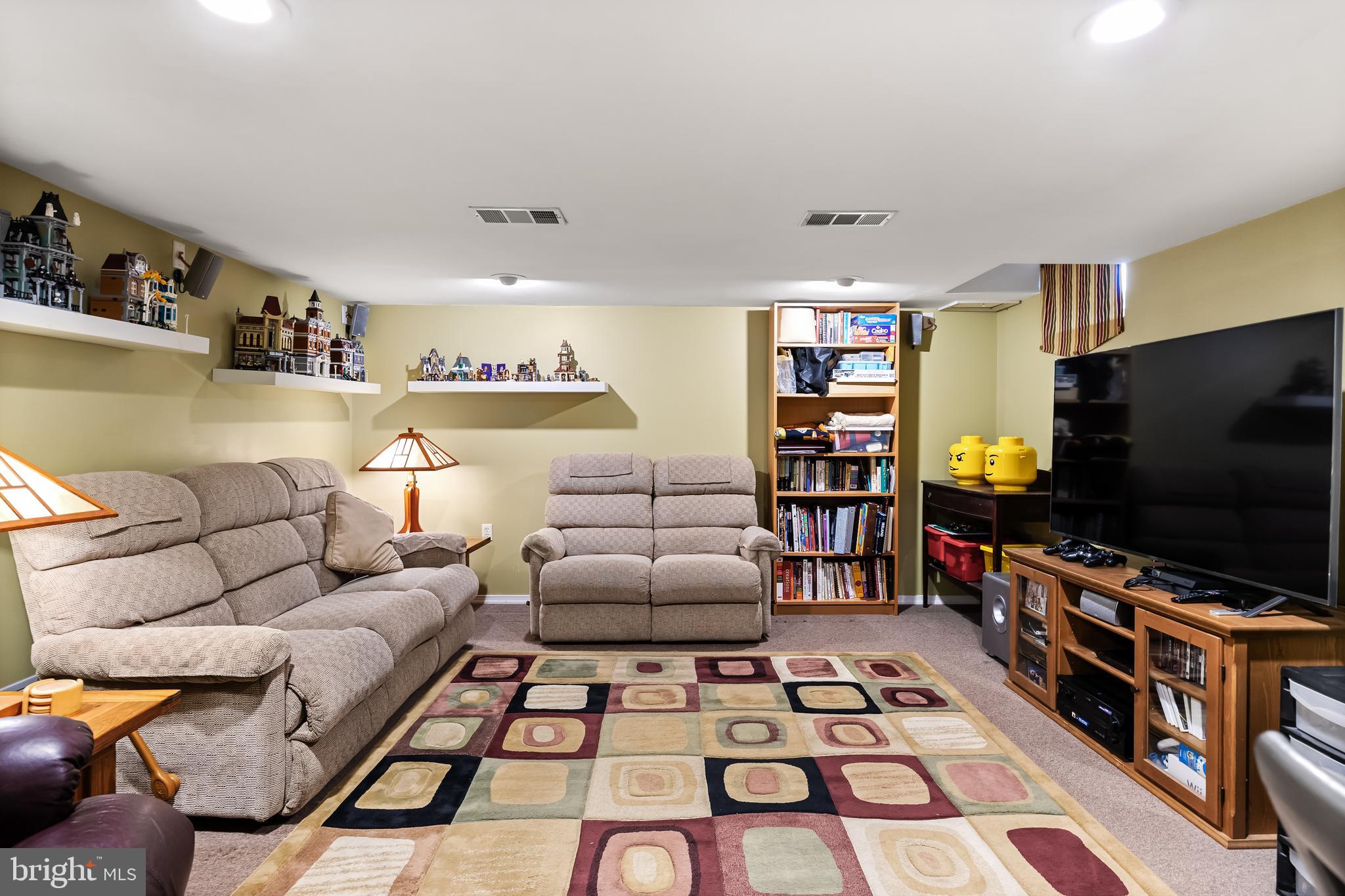 6 Read Drive Sicklerville, NJ 08081 - Photo 28 of 36 a living room with furniture and a flat screen tv