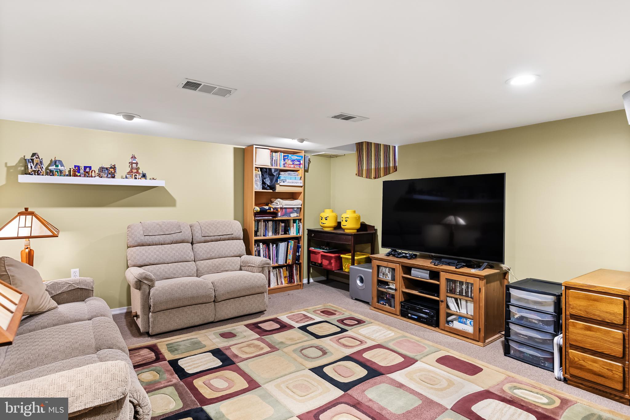 6 Read Drive Sicklerville, NJ 08081 - Photo 29 of 36 a living room with furniture and a flat screen tv
